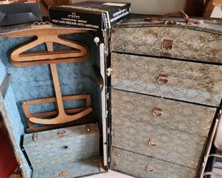 antique steamer trunk, opens up to hang clothes