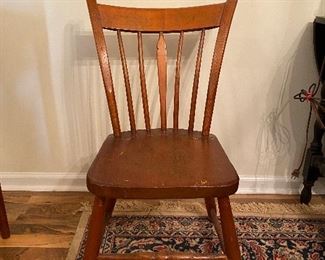 Single wooden antique chair. Back appears to have been repaired. Asking $20. 