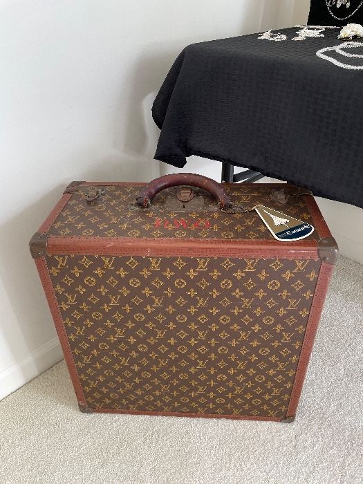 Louis Vuitton vintage travel trunk.  Luggage tag from the Concorde.  Currently locked, no key.