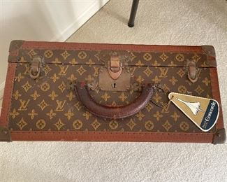 Louis Vuitton vintage travel trunk.  Luggage tag from the Concorde.  Currently locked, no key.