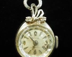 DeVille Ladies Wristwatch With 14K White Gold Backing And Clear Stones, Possibly Diamond, And 1/20 10K GF Band