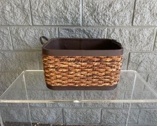 Lot #47 in the Town & Sea Fall Multi-Seller Sale is a Woven Rectangular Basket and is 19"w x 13.5"d x 10"h The condition of these  is Good condition, see photos. The auction closes 11/30 at 8pm. Place your bids today!