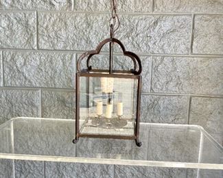 Lot #7 in the Town & Sea Fall Multi-Seller Sale is a Iron Hanging Lantern and is 9.25"w x 9"d x 18"h, plus an additional 7" chain The condition of these  is Overall good condition The auction closes 11/30 at 8pm. Place your bids today! https://townandsea.com/sales/fall-multi-seller-sale/