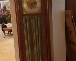 Seth Thomas grandfather clock with beautiful face and top. Key will open door but repair person tried to get it to work and no go. Said parts needed would have to be custom made.