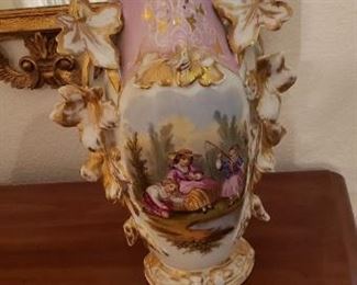 Beautiful painted large vase. Shows family at a pond. Gold and white leaves around edges. Very unique!