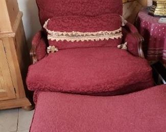 Bergere chair and foot stool. Back lumbar pillor with trim. Very comfortable. Dusty red color