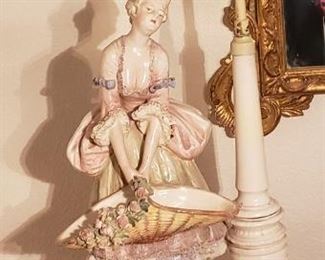 Antique lady carrying a basket of flowers. Very unique lamp