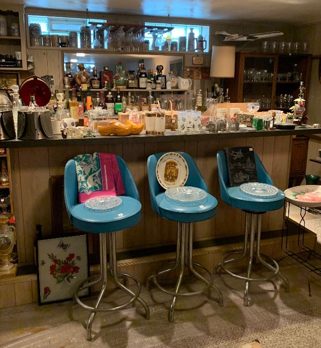 Fabulous MCM bar -amazing barware collection and sweet turquoise bar stools!