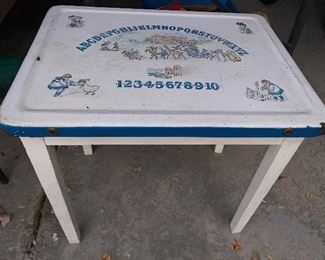 Enamel top child’s table with alphabet, numbers and nursery rhyme designs!