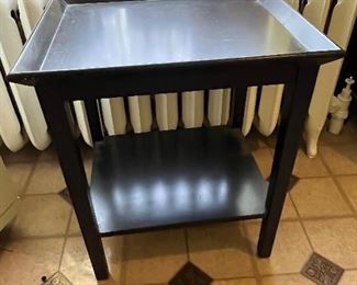 Painted black side table