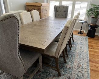 Dining Room Table and Chairs shown with extra leaf in place purchased from Ashley Furniture.