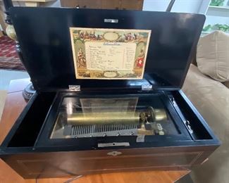 Closer look at the "Columbia" model Swiss Music Box. Comb is complete (no missing or damaged teeth).  We have the crank as well