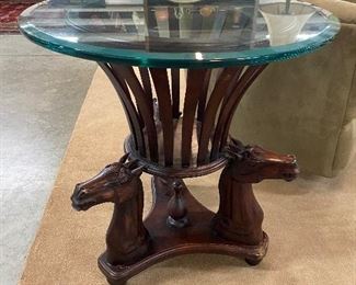Round, Glass-top Table with carved Horse Detail at the Base