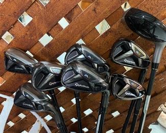 8 Taylor Made M2 golf cubs with flex steel shafts