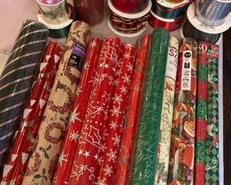 Lots of wrapping paper and ribbon - unopened.