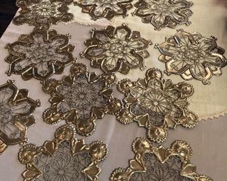 Snowflake ornaments pressed cut out of metal.  Large and nice.