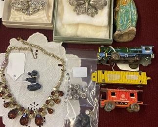Jewelry, buttons, tin train cars, old oriental pottery figurine