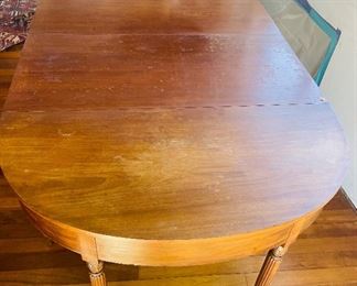Pair of Demi lune tables making a dining table (one leg need  repairs)
Dining Table 45Wx82Lx29H becomes 2 half moon table 21"D  x45W