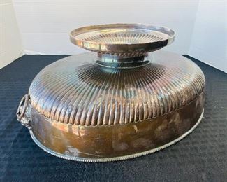110______$150 
Silver plated centerpiece with lion's head handles 15x6