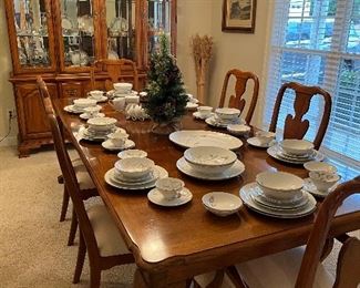 nice table w/6 chairs & set of china