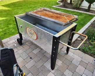 AVAILABLE NOW FOR PRE-SALE Pig Roaster Box by La Caja China inc. Accessories ($85)
