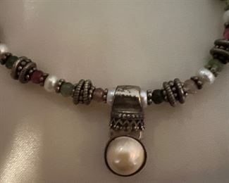 necklace’s pearl detail