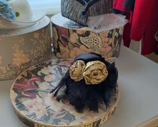 vintage black hat with black feather and gold color floral