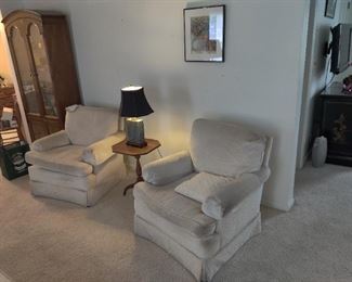 2 white chairs, table, granite base lamp