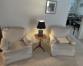 2 white chairs, table, granite base lamp