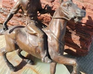 Horse and Jockey on stone figure