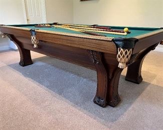Art Nouveau billiard pool table, ca. 1904 by Brunswick, Balke & Collender Company; oak, mahogany and rosewood, with double elephant feet on elephant legs. Excellent condition, completely and professionally restored.