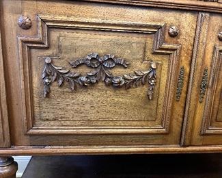 Classic French Country Revival server, ca. late-19th - early-20th centuries; oak, brass, glass and Carrara marble. Carvings of oak leaves, scrolls, rectangles, shaped reeding, acanthus leaves and Louis XV linen fold ribbons.