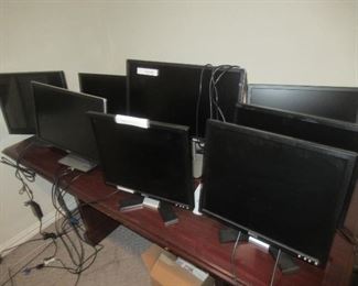 EIGHT PC MONITORS THAT WERE REMOVED FROM A WORKING ENVIRONMENT