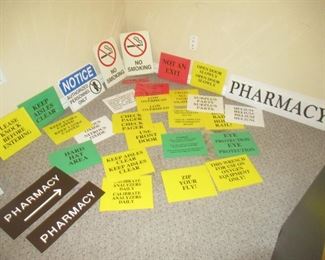 ASSORTMENT OF BUSINESS SIGNS