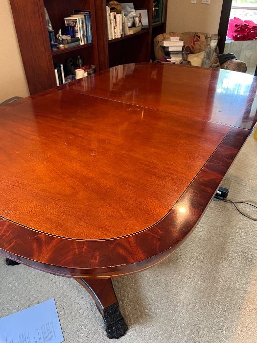 $960. Beautiful table with two pedestals for easy seating.  Protective pads included.  80"l (as shown) x 48"w x 30"h.  Four leaves each 16" wide so table can be 96"l or 112"l or 128"L or 144"L.  Room for everyone!  Originally $22,000