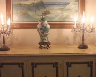 Buffet/server and chandelier lamps.