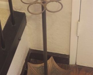 Iron inverted umbrella stand.