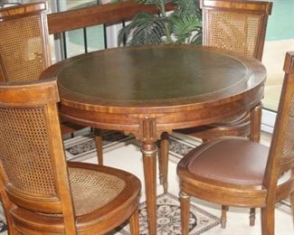 Leather inlaid games table  with chairs.