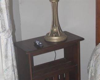 Magazine rack and Tiffany style lamp.