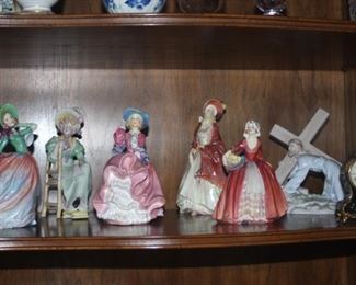 Shelves filled with crystal, bone china, figurines.