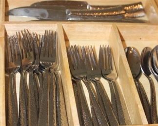 Hand hammered flatware.