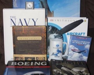 Navy, Boeing, aircraft and flight books with Boeing memorabilia.