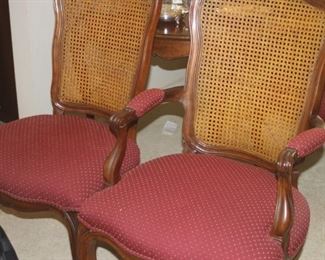 Dining table with 6 chairs, leaves and pads.