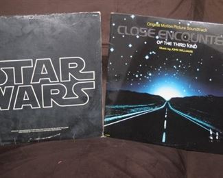 Star Wars and Close Encounters theme track LPs.