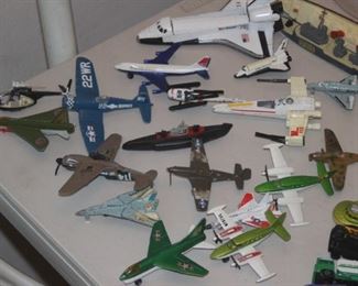 Selection of metal aircraft toys.