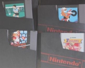 Classic Nintendo Entertainment System with controllers and games. 