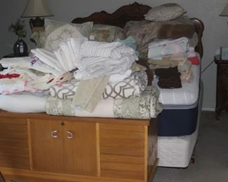 Bed linens, blankets, comforters.