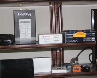 Lumix  and canon cameras, Bluetooth calculator.