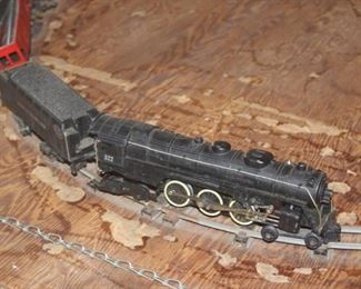 Train track, trains, scenery and power transformer.