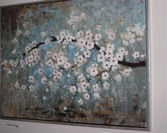 Framed peach blossom art work.